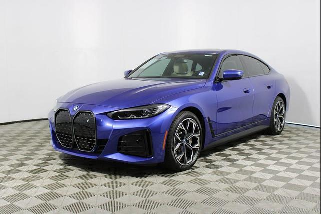 Photo of 2022 Portimao Blue Metallic BMW i4 Gran Coupe
