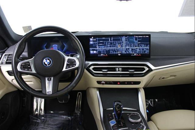 Photo of 2022 Portimao Blue Metallic BMW i4 Gran Coupe