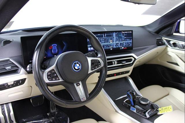 Photo of 2022 Portimao Blue Metallic BMW i4 Gran Coupe