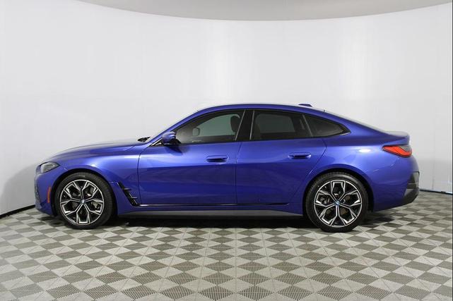 Photo of 2022 Portimao Blue Metallic BMW i4 Gran Coupe