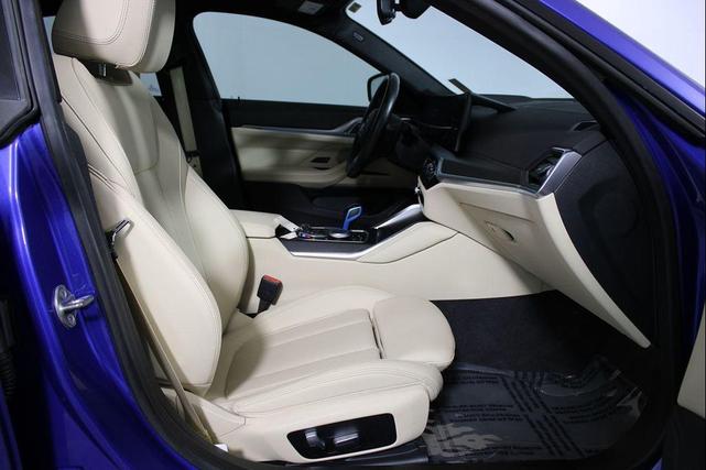 Photo of 2022 Portimao Blue Metallic BMW i4 Gran Coupe