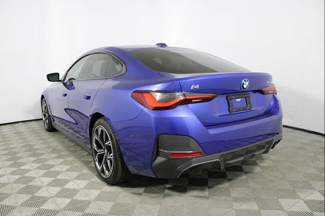 Photo of 2022 Portimao Blue Metallic BMW i4 Gran Coupe