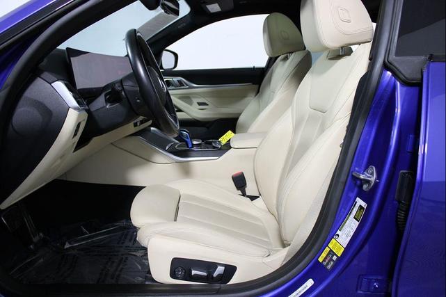 Photo of 2022 Portimao Blue Metallic BMW i4 Gran Coupe