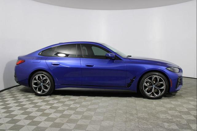 Photo of 2022 Portimao Blue Metallic BMW i4 Gran Coupe