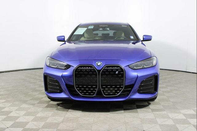 Photo of 2022 Portimao Blue Metallic BMW i4 Gran Coupe