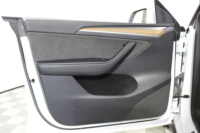 Photo of 2023 Pearl White Multi-Coat Tesla Model Y