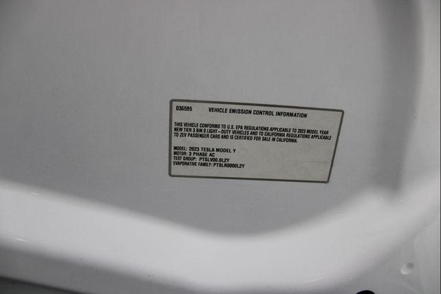 Photo of 2023 Pearl White Multi-Coat Tesla Model Y