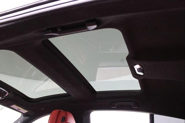 Photo of 2022 Carbon Black Metallic BMW 840
