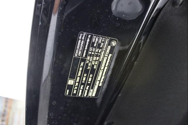 Photo of 2022 Carbon Black Metallic BMW 840