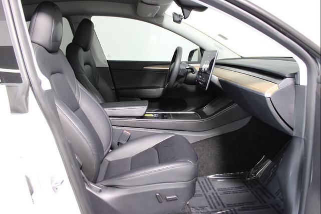 Photo of 2023 Pearl White Multi-Coat Tesla Model Y