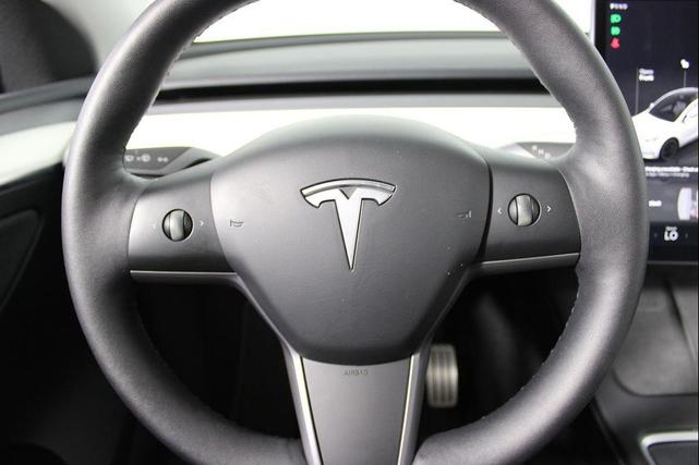 Photo of 2024 Pearl White Multi-Coat Tesla Model Y