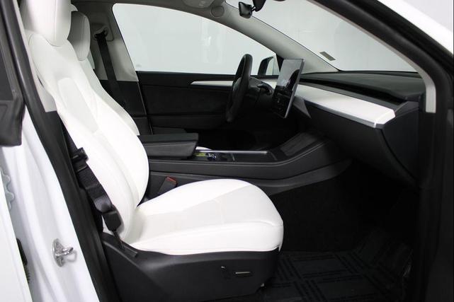 Photo of 2024 Pearl White Multi-Coat Tesla Model Y