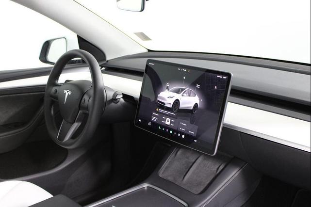 Photo of 2024 Pearl White Multi-Coat Tesla Model Y