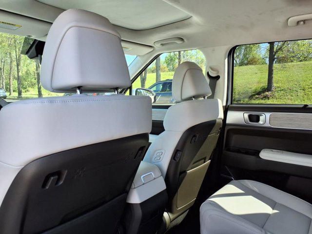 Photo of 2025 Serenity White Hyundai SANTA FE HEV