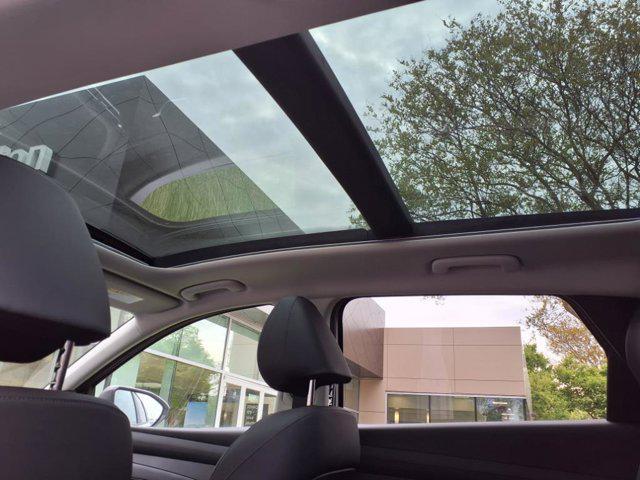 Photo of 2025 Creamy White Pearl Hyundai TUCSON Hybrid