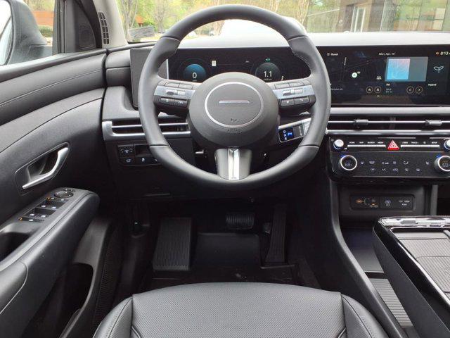 Photo of 2025 Creamy White Pearl Hyundai TUCSON Hybrid