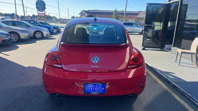 Photo of 2014 Tornado Red Volkswagen Beetle