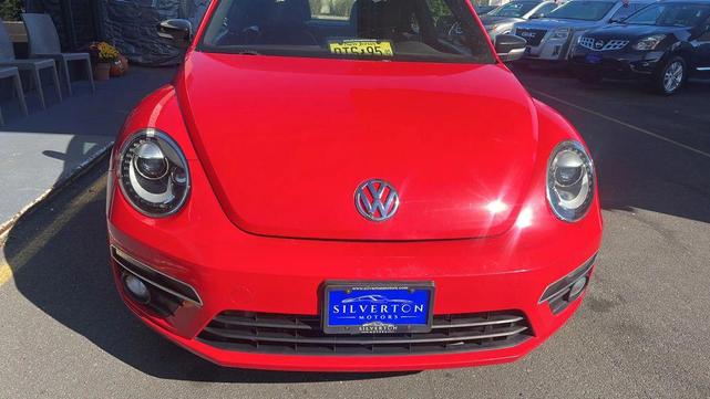 Photo of 2014 Tornado Red Volkswagen Beetle