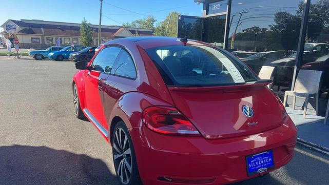 Photo of 2014 Tornado Red Volkswagen Beetle