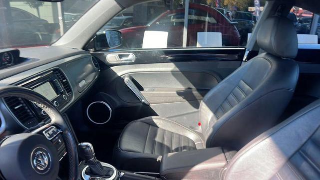 Photo of 2014 Tornado Red Volkswagen Beetle