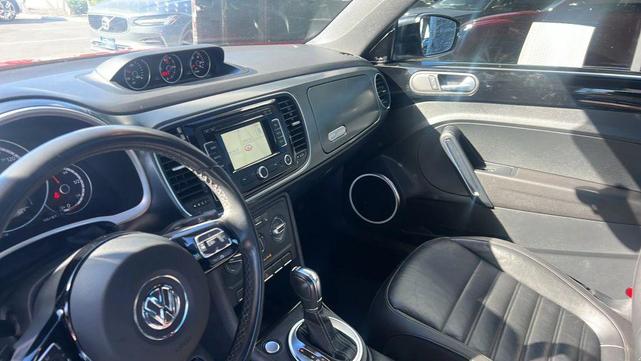 Photo of 2014 Tornado Red Volkswagen Beetle