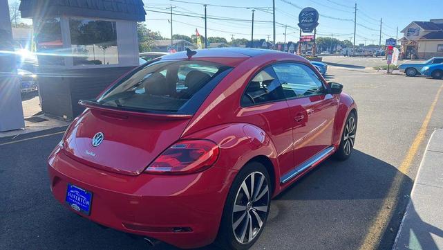 Photo of 2014 Tornado Red Volkswagen Beetle