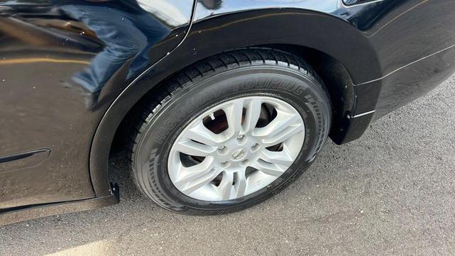 Photo of 2011 Super Black Nissan Altima