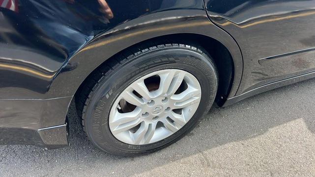 Photo of 2011 Super Black Nissan Altima