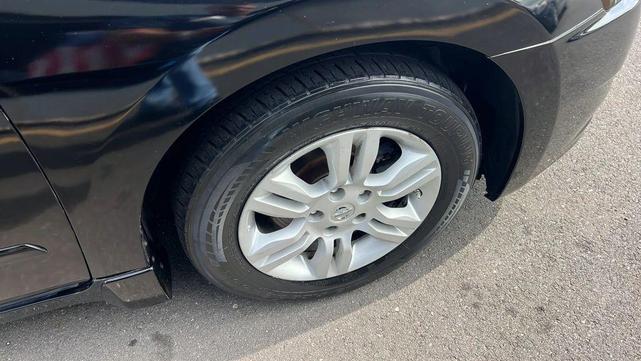 Photo of 2011 Super Black Nissan Altima
