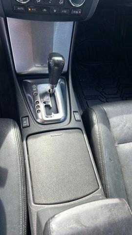 Photo of 2011 Super Black Nissan Altima