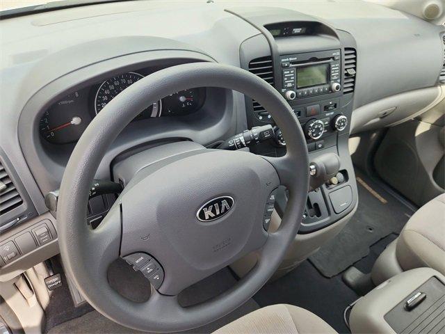 Photo of 2014 Glacier Blue Kia Sedona