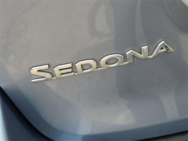 Photo of 2014 Glacier Blue Kia Sedona