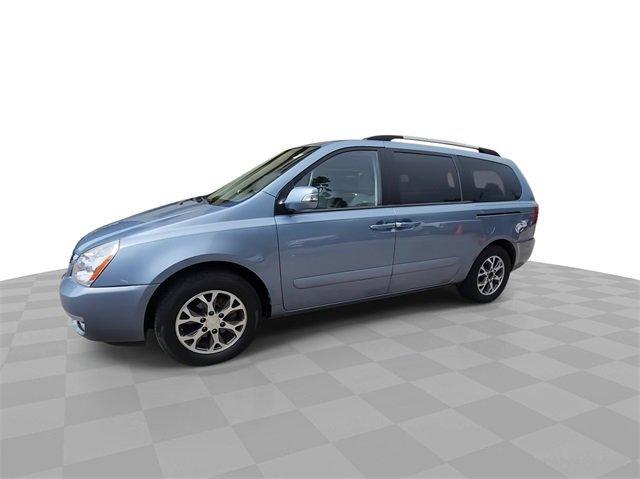 Photo of 2014 Glacier Blue Kia Sedona