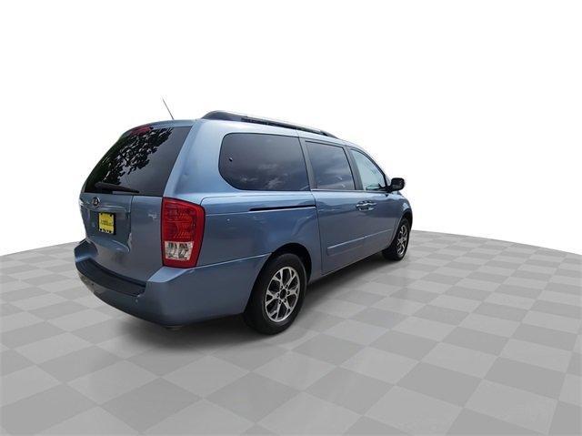Photo of 2014 Glacier Blue Kia Sedona