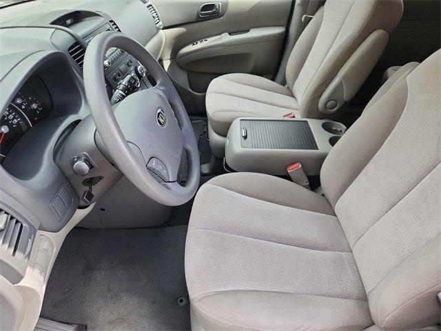 Photo of 2014 Glacier Blue Kia Sedona