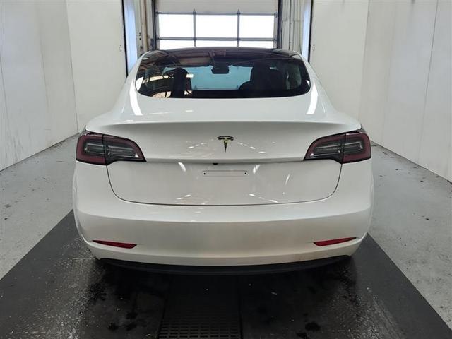 Photo of 2023 Pearl White Multi Tesla Model 3