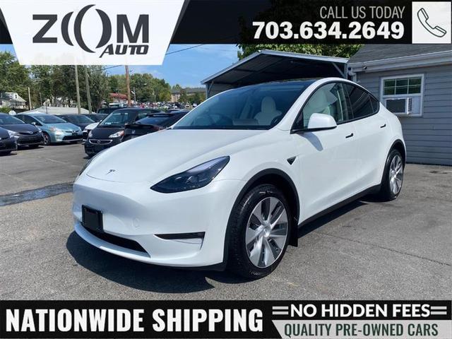 Photo of 2023 Pearl White Multi-Coat Tesla Model Y