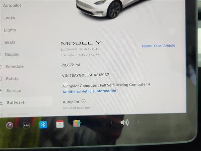 Photo of 2024 Pearl White Multi Tesla Model Y