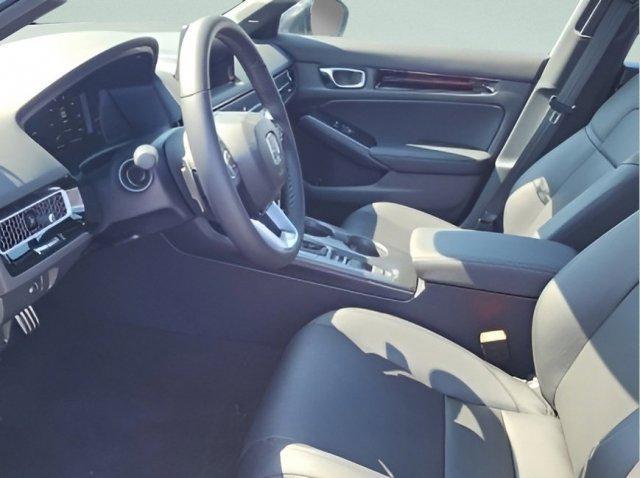 Photo of 2026 Blue Lagoon Pearl Honda Civic Hybrid