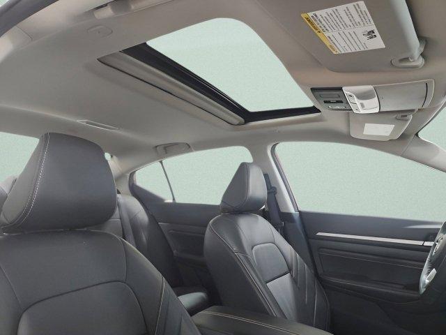 Photo of 2023 Scarlet Ember Tintcoat Nissan Altima