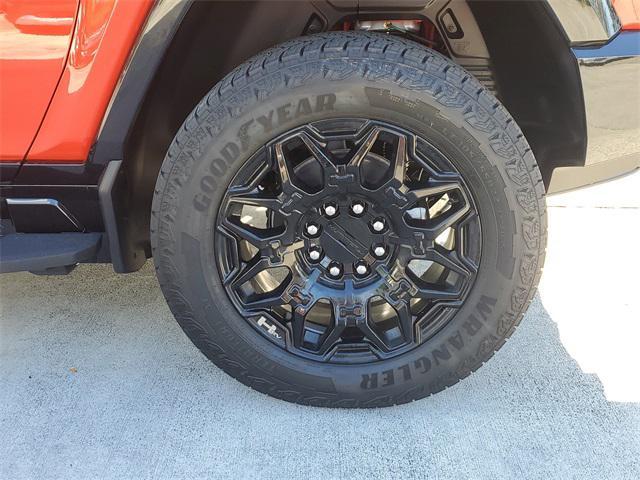 Photo of 2025 Solar Orange GMC HUMMER EV SUV