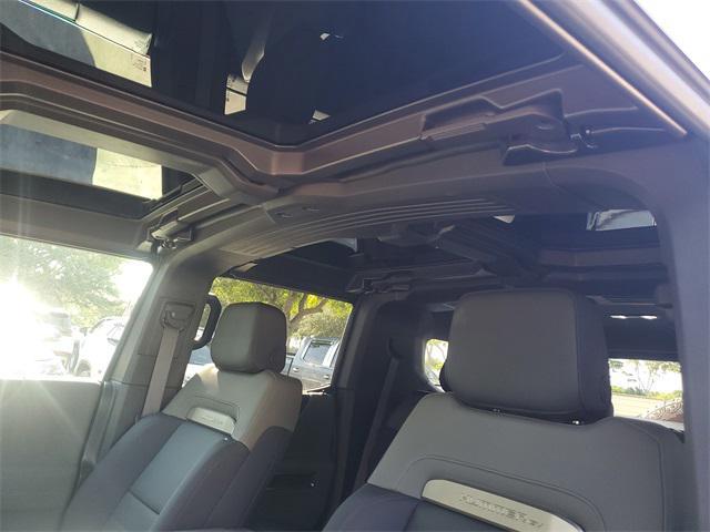 Photo of 2025 Solar Orange GMC HUMMER EV SUV