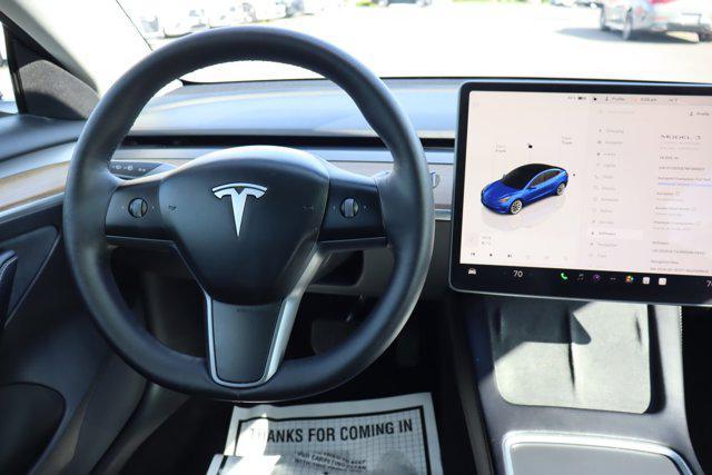 Photo of 2022 Deep Blue Metallic Tesla Model 3