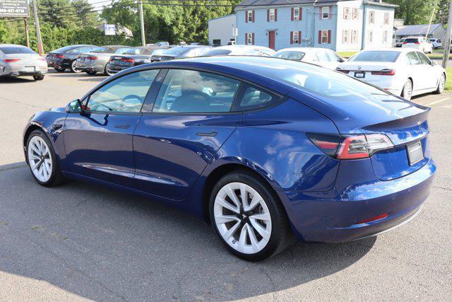 Photo of 2022 Deep Blue Metallic Tesla Model 3