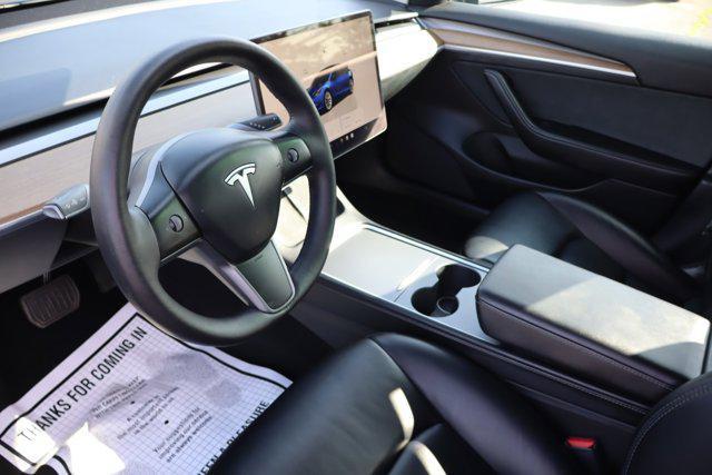 Photo of 2022 Deep Blue Metallic Tesla Model 3
