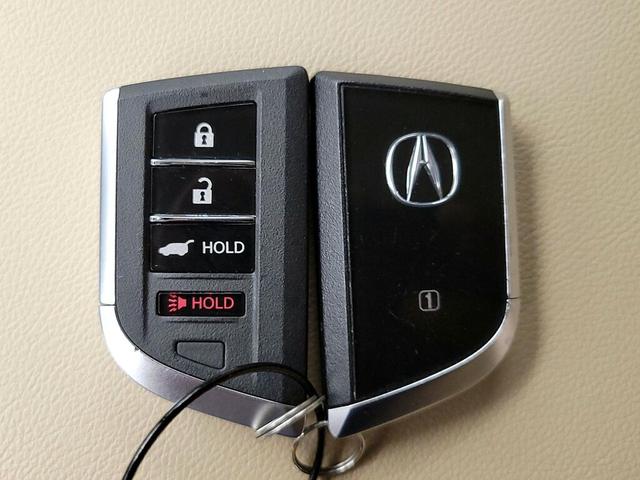 Photo of 2023 White Acura MDX