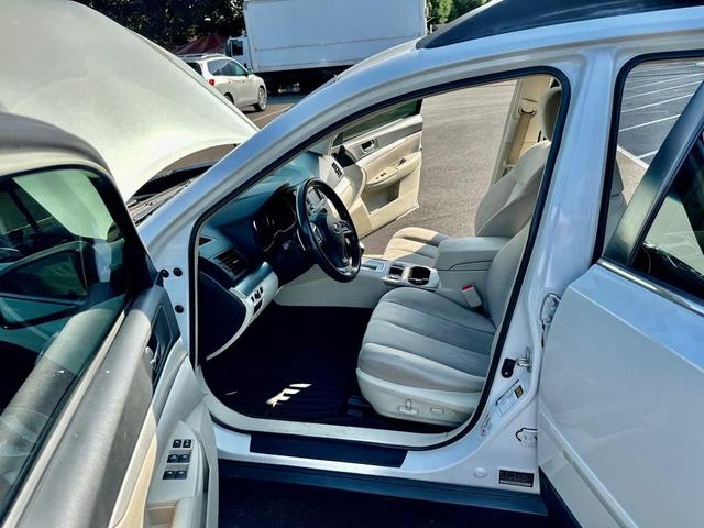 Photo of 2014 Satin White Pearl Subaru Outback
