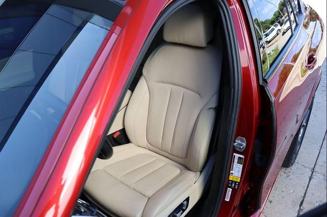 Photo of 2021 Flamenco Red Metallic BMW X6