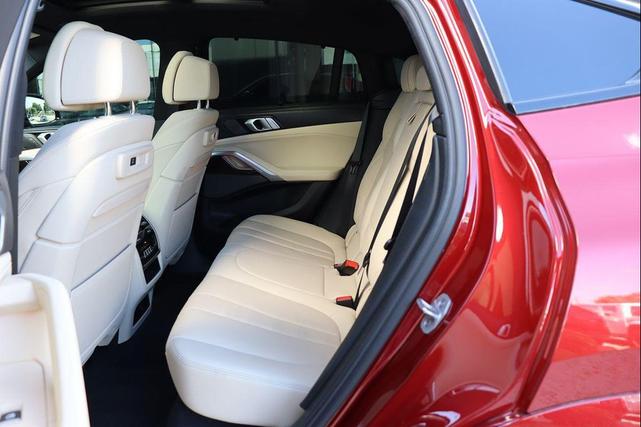 Photo of 2021 Flamenco Red Metallic BMW X6
