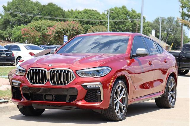 Photo of 2021 Flamenco Red Metallic BMW X6